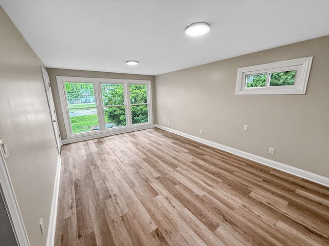 2914 Ridge Rd, Lansing, IL 60438 - empty room with baseboards and light wood finished floors
