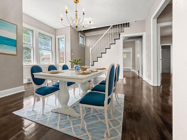 2914 Ridge Rd, Lansing, IL 60438 - dining area featuring a chandelier, stairway, and dark wood-type flooring