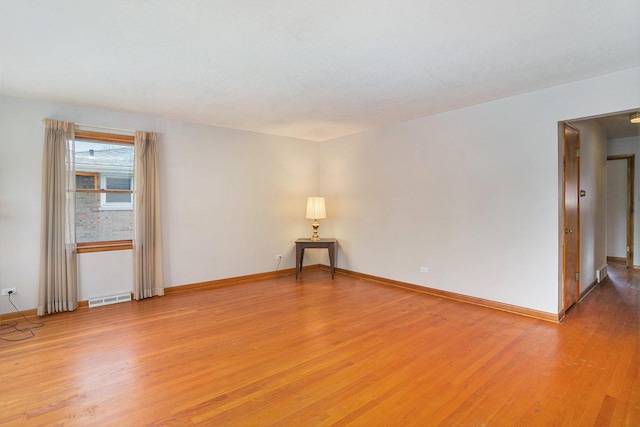 2454 184th St, Lansing, IL 60438 - empty room featuring light wood-style floors and baseboards