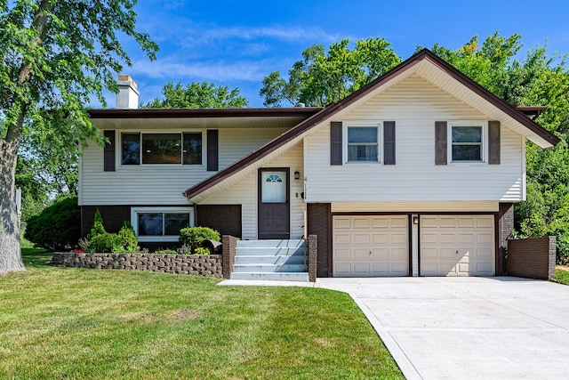 1328 Concord Ln, Schaumburg, IL 60193 - split foyer home featuring brick siding, an attached garage, a chimney, and a front yard