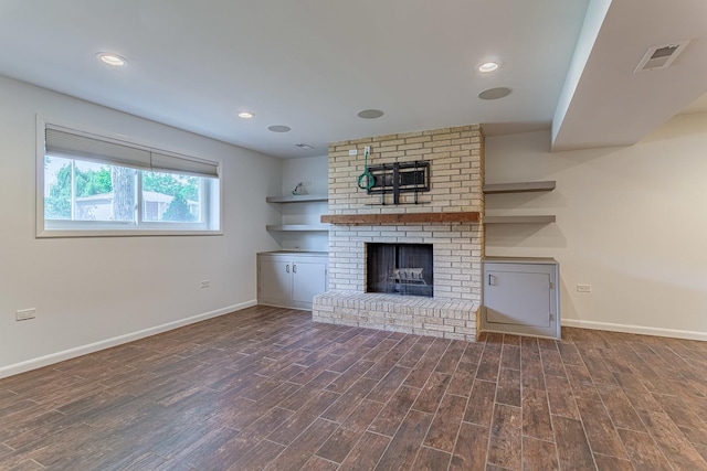1328 Concord Ln, Schaumburg, IL 60193 - unfurnished living room featuring wood finished floors, a brick fireplace, and recessed lighting
