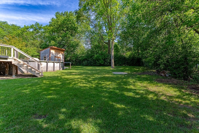 1328 Concord Ln, Schaumburg, IL 60193 - view of grassy yard with stairs and a storage shed