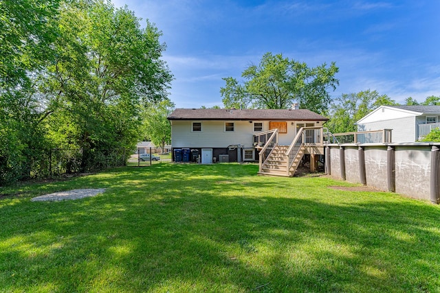 1328 Concord Ln, Schaumburg, IL 60193 - back of house featuring stairs, a deck, and a chimney