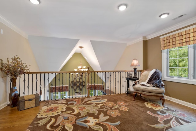 1835 Rizzi Ln, Bartlett, IL 60103 - living area with wood finished floors, a chandelier, and ornamental molding