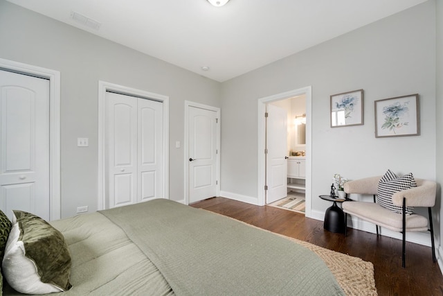 3437 S Morgan St Unit 2E, Chicago, IL 60608 - bedroom featuring wood finished floors, baseboards, and connected bathroom