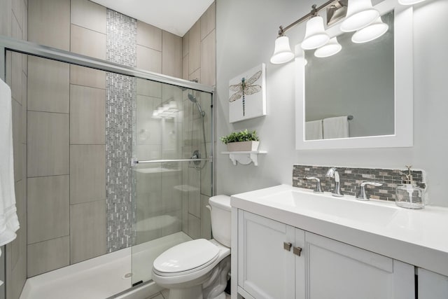 3437 S Morgan St Unit 2E, Chicago, IL 60608 - full bath with toilet, vanity, backsplash, and a shower stall