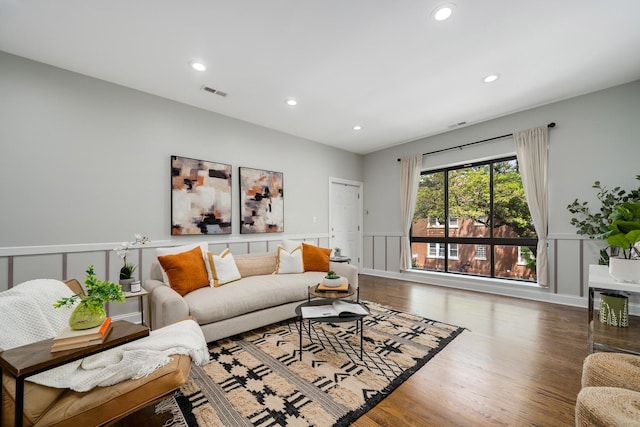 3437 S Morgan St Unit 2E, Chicago, IL 60608 - living area with a wainscoted wall, wood finished floors, a decorative wall, and recessed lighting