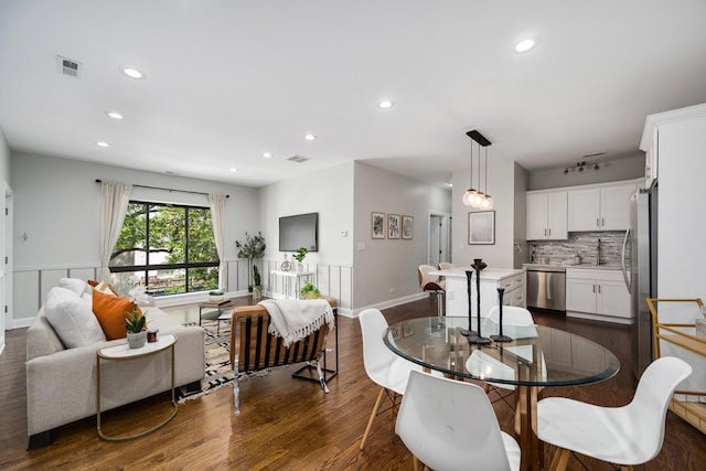 3437 S Morgan St Unit 2E, Chicago, IL 60608 - dining room with dark wood-type flooring, recessed lighting, and baseboards