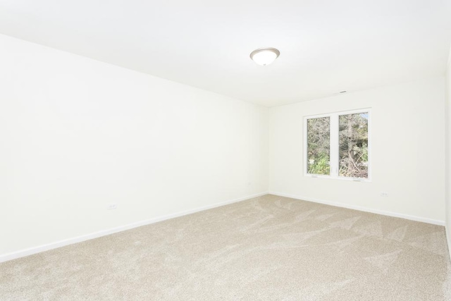 5540 Hearthside Dr, Bourbonnais, IL 60914 - unfurnished room with light carpet and baseboards