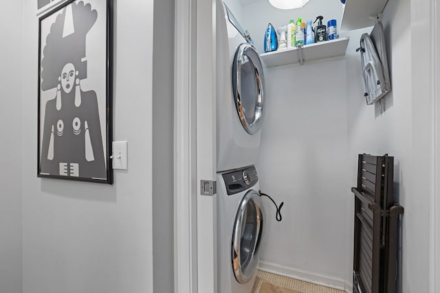5844 N Hermitage Ave Unit B, Chicago, IL 60660 - washroom with stacked washing machine and dryer and tile patterned flooring