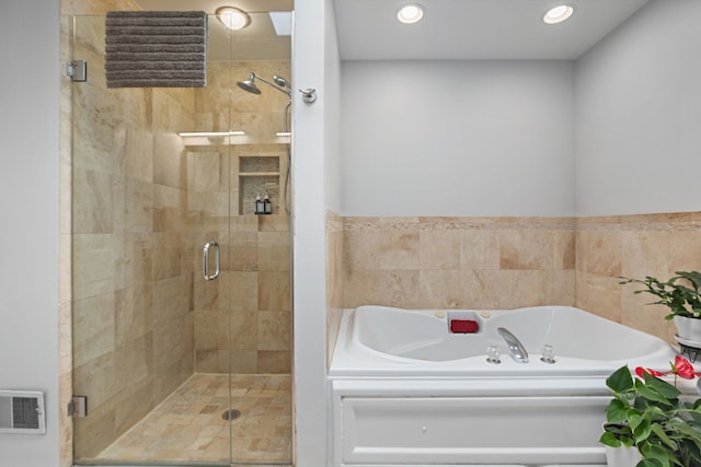 5844 N Hermitage Ave Unit B, Chicago, IL 60660 - bathroom featuring a bath, a shower stall, and recessed lighting