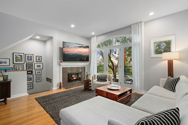 5844 N Hermitage Ave Unit B, Chicago, IL 60660 - living room featuring wood finished floors, recessed lighting, and a tile fireplace