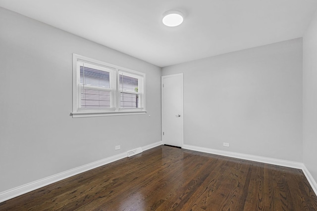6037 S Mason Ave, Chicago, IL 60638 - empty room featuring baseboards and dark wood finished floors