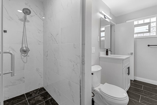 6037 S Mason Ave, Chicago, IL 60638 - bathroom with a stall shower, vanity, marble finish flooring, toilet, and baseboards