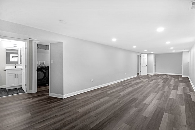 6037 S Mason Ave, Chicago, IL 60638 - unfurnished living room featuring dark wood finished floors, recessed lighting, baseboards, and washer / dryer
