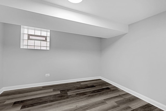 6037 S Mason Ave, Chicago, IL 60638 - unfurnished room with dark wood-style floors and baseboards
