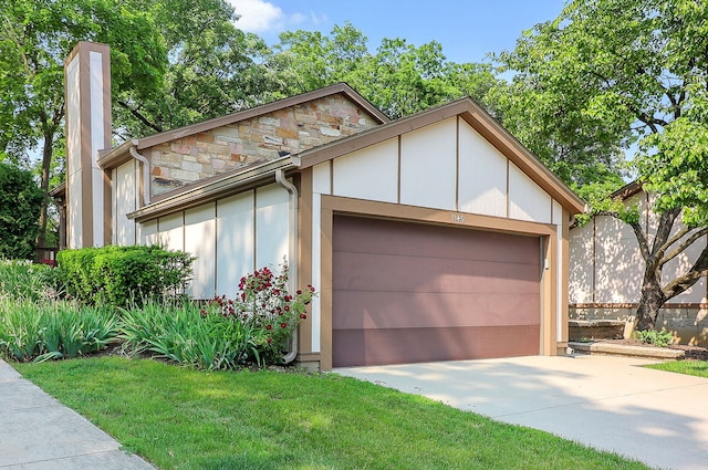 1149 Wheaton Oaks Dr Unit 0, Wheaton, IL 60187 - view of front facade featuring a chimney, stone siding, an attached garage, and driveway