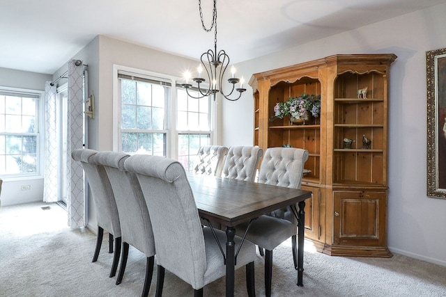 1149 Wheaton Oaks Dr Unit 0, Wheaton, IL 60187 - dining room featuring light carpet, plenty of natural light, and a chandelier