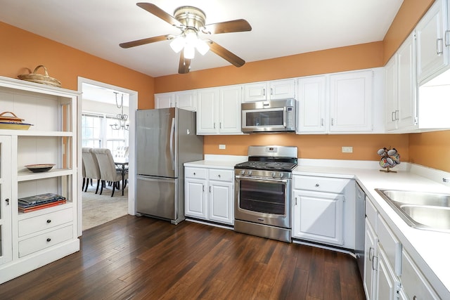 1149 Wheaton Oaks Dr Unit 0, Wheaton, IL 60187 - kitchen featuring appliances with stainless steel finishes, light countertops, a ceiling fan, dark wood-style floors, and white cabinets