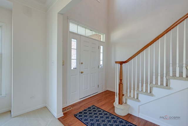 15 Open Pkwy N, Hawthorn Woods, IL 60047 - entrance foyer featuring stairway, crown molding, and wood finished floors