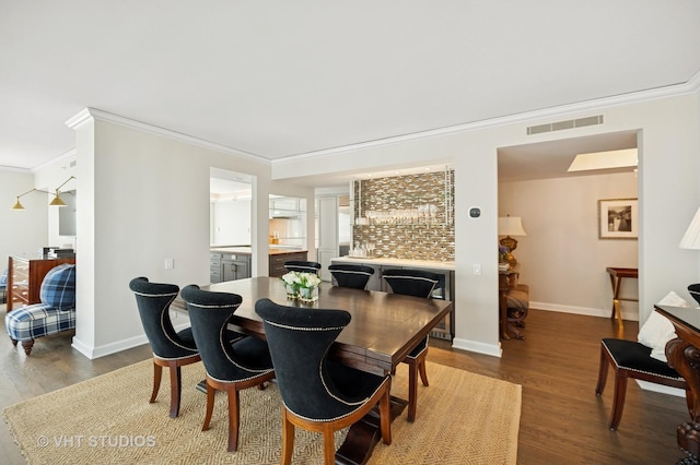 132 E Delaware Pl Unit 5106, Chicago, IL 60611 - dining room featuring ornamental molding and wood finished floors