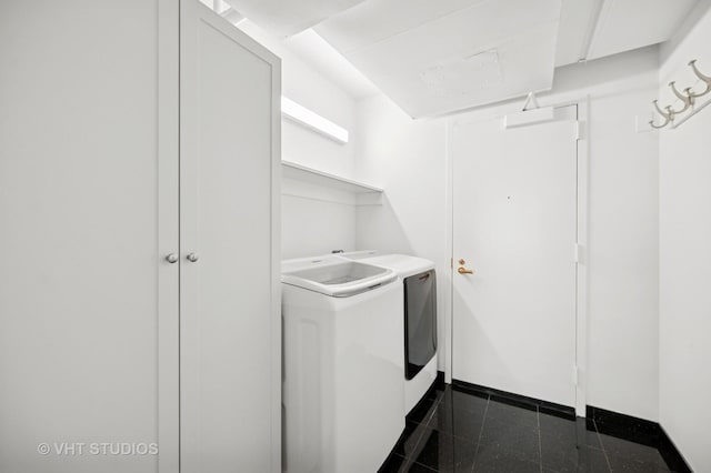 132 E Delaware Pl Unit 5106, Chicago, IL 60611 - laundry area with granite floors and washer and dryer