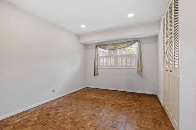 5927 Sherman Dr, Woodridge, IL 60517 - unfurnished bedroom featuring a closet, baseboards, and recessed lighting