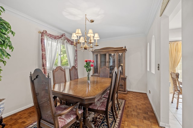 5927 Sherman Dr, Woodridge, IL 60517 - dining area featuring a chandelier, baseboards, and ornamental molding