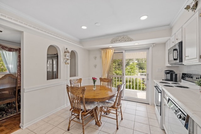 5927 Sherman Dr, Woodridge, IL 60517 - dining room featuring ornamental molding, plenty of natural light, recessed lighting, baseboards, and light tile patterned floors
