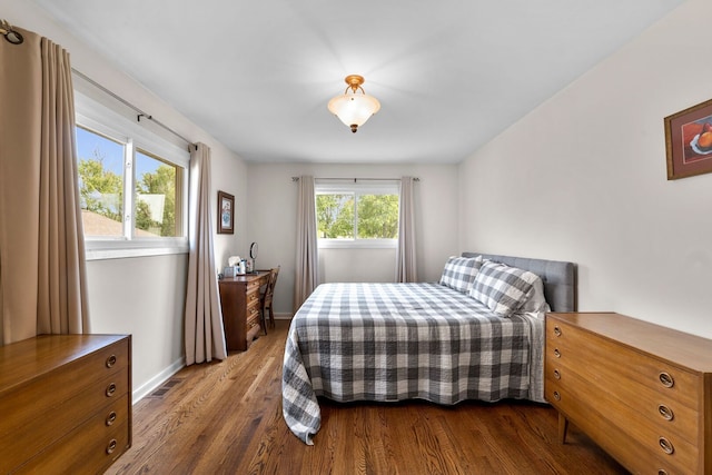 773 Farnham Ln, Wheaton, IL 60189 - bedroom with dark wood-style flooring and baseboards