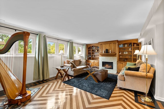773 Farnham Ln, Wheaton, IL 60189 - living area featuring healthy amount of natural light, a lit fireplace, and built in shelves