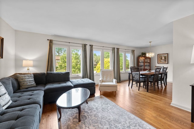 773 Farnham Ln, Wheaton, IL 60189 - living area with a chandelier and light wood finished floors