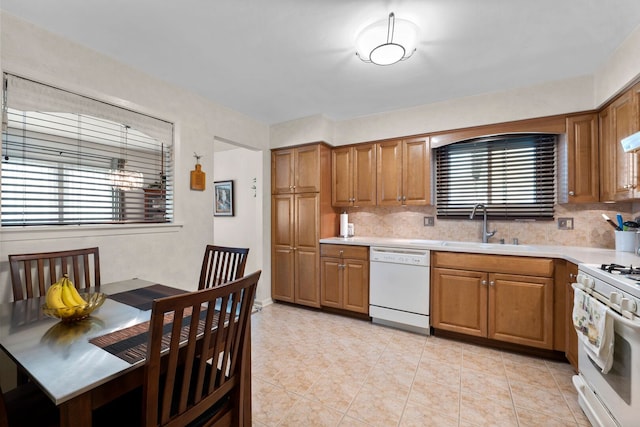773 Farnham Ln, Wheaton, IL 60189 - kitchen with white appliances, light countertops, backsplash, and brown cabinets