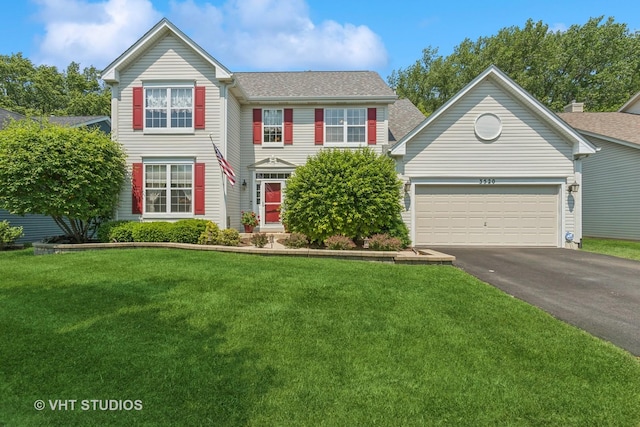 3520 Antoine Pl, Saint Charles, IL 60175 - view of front of home with an attached garage and a front lawn