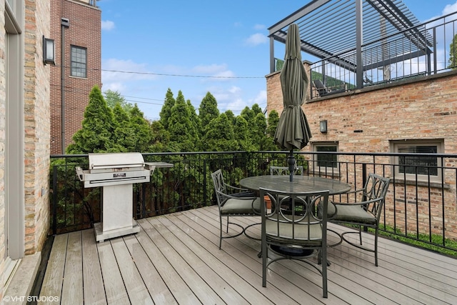 1230 W Cornelia Ave, Chicago, IL 60657 - wooden terrace featuring outdoor dining space and area for grilling