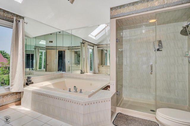 16924 Yearling Crossing Dr, Orland Park, IL 60467 - full bathroom featuring a stall shower, a tub with jets, a skylight, tile patterned flooring, and toilet