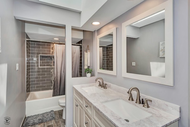 16924 Yearling Crossing Dr, Orland Park, IL 60467 - full bath with double vanity, toilet, shower / bath combination with curtain, recessed lighting, and wood finished floors