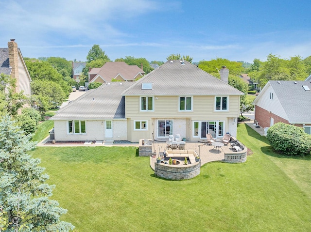 16924 Yearling Crossing Dr, Orland Park, IL 60467 - rear view of property featuring a yard, a patio, a chimney, and brick siding