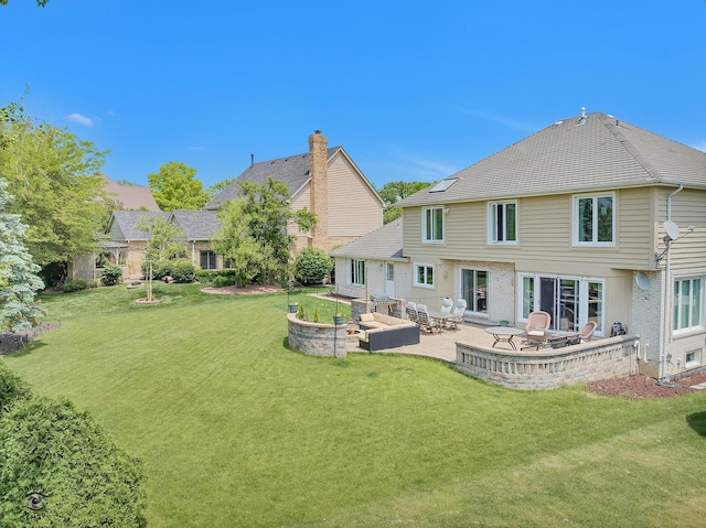 16924 Yearling Crossing Dr, Orland Park, IL 60467 - rear view of property featuring a patio area and a lawn