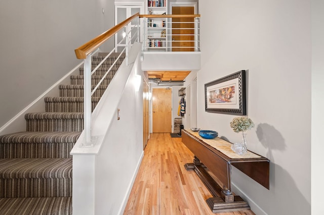 2111 W Churchill St Unit 112, Chicago, IL 60647 - stairs with wood finished floors and a towering ceiling