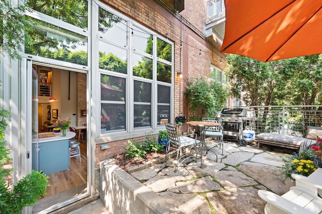 2111 W Churchill St Unit 112, Chicago, IL 60647 - view of patio / terrace with outdoor dining area and grilling area