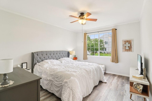 245 Grays Dr, Oswego, IL 60543 - bedroom featuring wood finished floors, baseboards, ornamental molding, and a ceiling fan