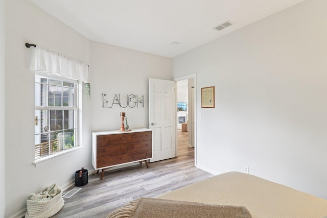 245 Grays Dr, Oswego, IL 60543 - bedroom with wood finished floors and baseboards