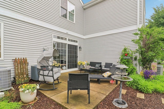 245 Grays Dr, Oswego, IL 60543 - view of patio featuring central AC and an outdoor hangout area