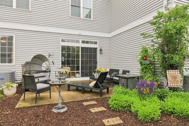 245 Grays Dr, Oswego, IL 60543 - view of patio with central AC unit and an outdoor living space