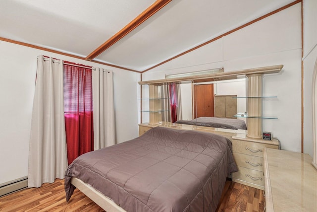 20214 Harmony Rd, Marengo, IL 60152 - bedroom featuring lofted ceiling, baseboard heating, and wood finished floors
