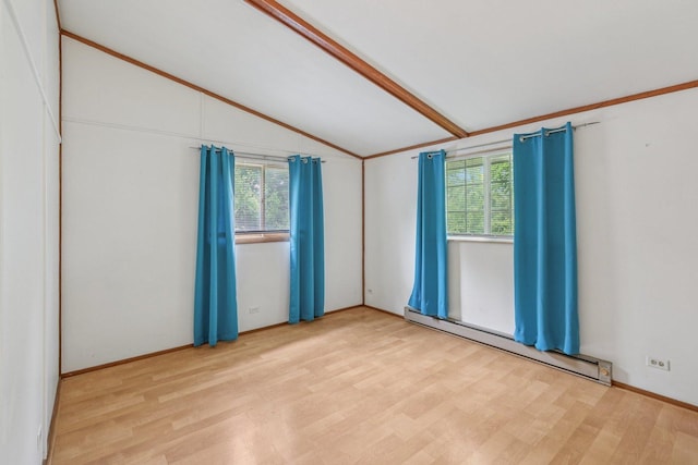 20214 Harmony Rd, Marengo, IL 60152 - empty room featuring a baseboard radiator, wood finished floors, and healthy amount of natural light