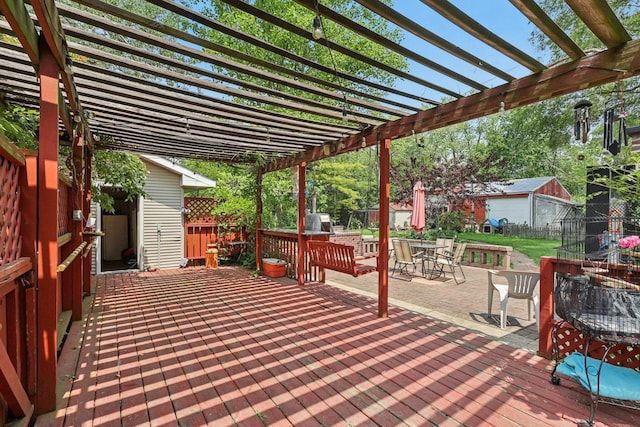 20214 Harmony Rd, Marengo, IL 60152 - deck with a pergola, outdoor dining space, and a fenced backyard