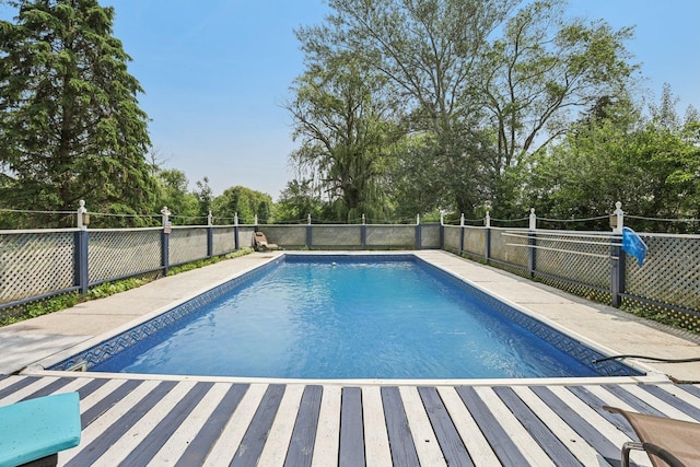 20214 Harmony Rd, Marengo, IL 60152 - view of swimming pool with view of wooded area