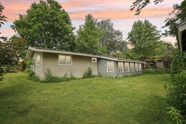 20214 Harmony Rd, Marengo, IL 60152 - rear view of property featuring a yard
